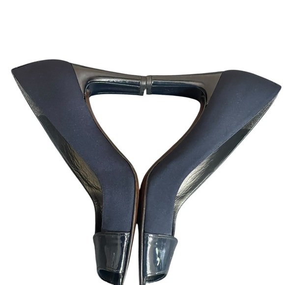Stuart Weitzman Pumps Peep Toe Navy Blue
Fabric & Black Patent Leather size 8.5M - Picture 8 of 13